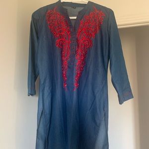 Never worn: blue denim top